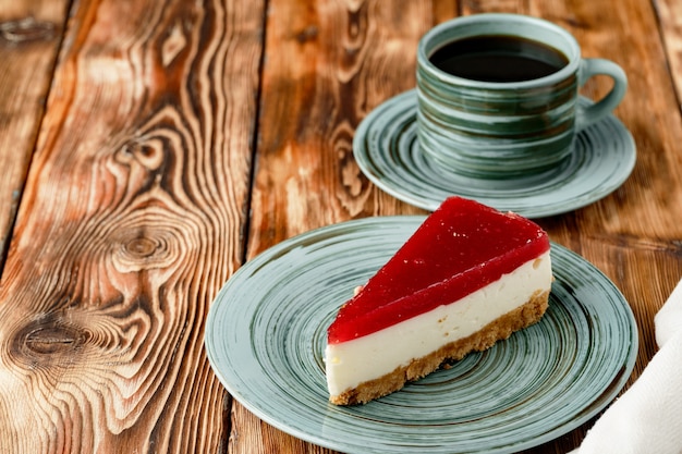 Photo layered mousse cake piece with berry topping