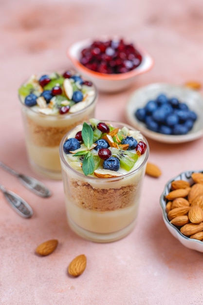 Layered trifle dessert in serving glasses.