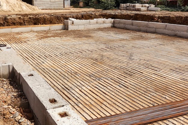 laying a concrete foundation on the construction site