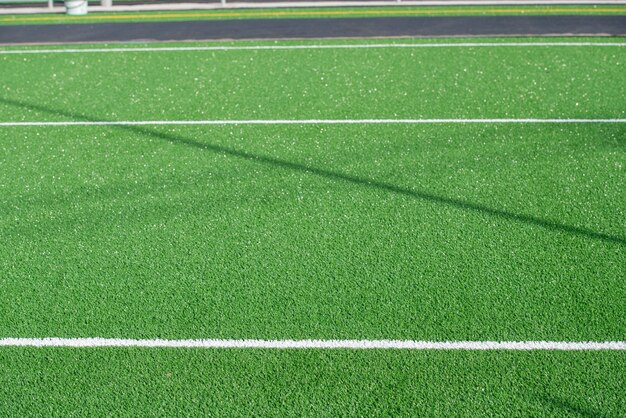 Laying of synthetic grass