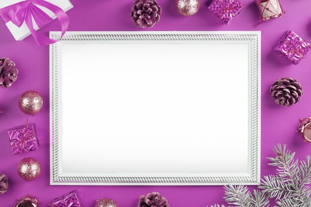 Layout of greeting cards with free space on a pink background with their Christmas decorations.