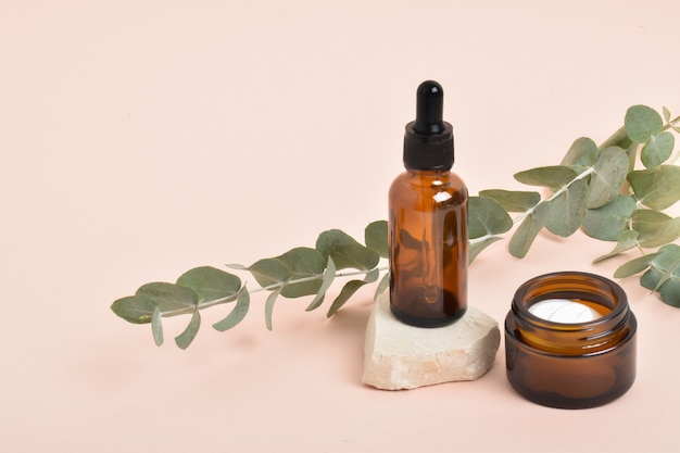 Layout of natural cosmetics made of eucalyptus with a place for text. Eco-invitation. Minimalism. Banner for cosmetics.