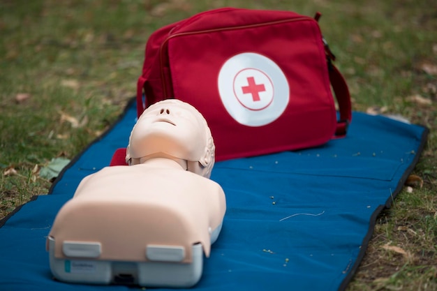 Photo layout for training in first aid training dummy for practicing artificial respiration