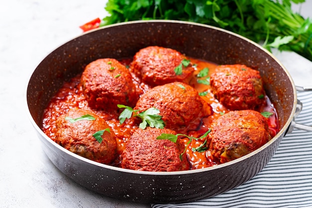 Lazy cabbage rolls stewed in sweet and sour tomato sauce Meatballs Beef cutlet