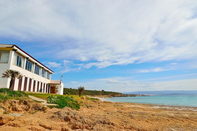 Le Bombarde beach under a cloudy sky Sardinia