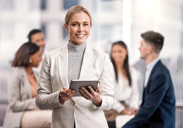 leader business woman and tablet outdoor with a smile for communication networking and research portrait of female entrepreneur in city with tech team and network connection for management