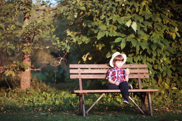 Leaf fall in the park Children for a walk in the autumn park Family Fall Happiness