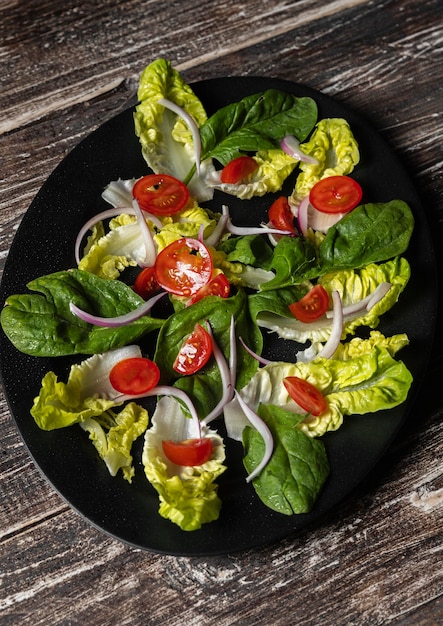 Leaf veggie salad and tomatoes