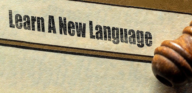 Learn A New Language words the chapter heading title at the start of page Education Concept