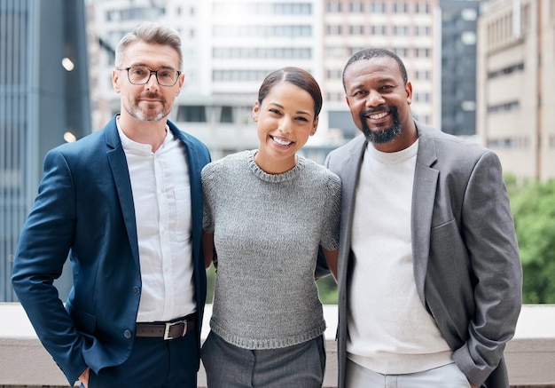 Learned the value of working hard by working hard Portrait of a group of businesspeople enjoying a break outside at the office