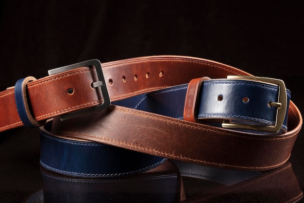 Leather belts on a black background Haberdashery