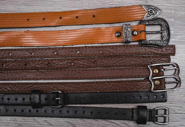 Leather belts on the table