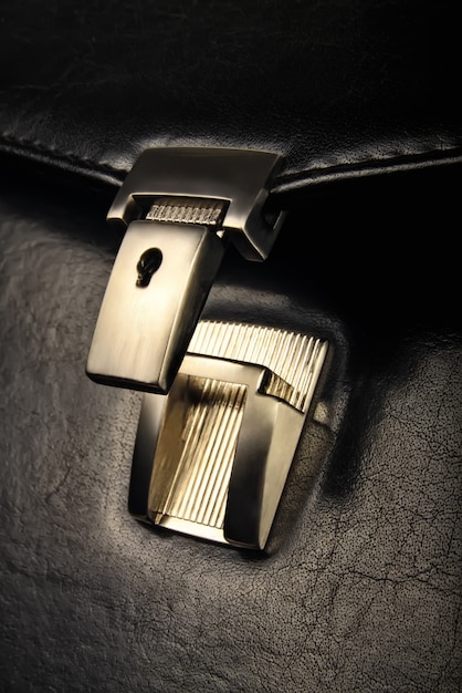 Leather briefcase lock closeup