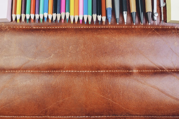 Leather desk with supplies