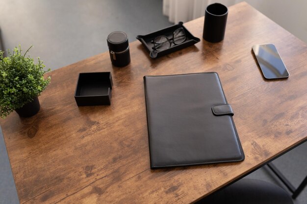 Leather folder for documents on the desktop in the office