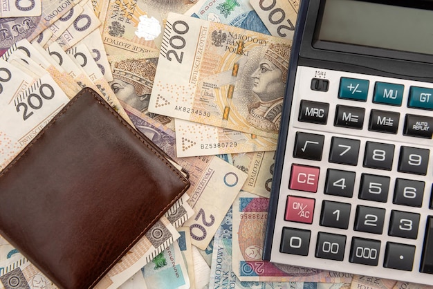 Leather wallet with calculator on polish zloty banknotes