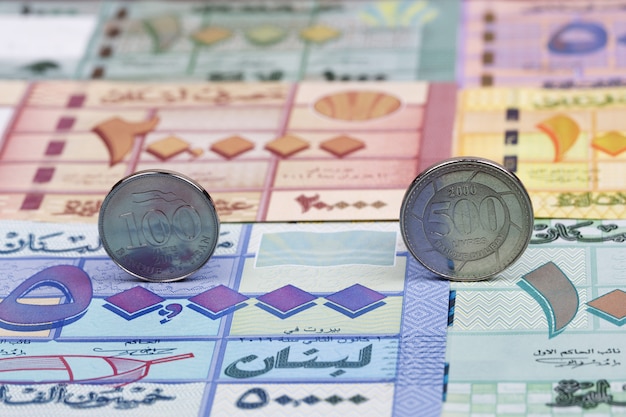 Lebanese coins on the background of money