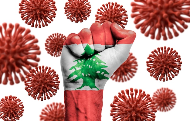 코로나바이러스와 싸우는 레바논 국기 주먹