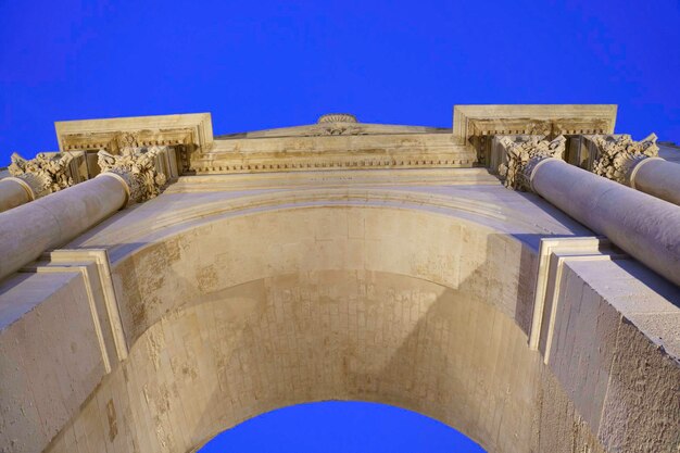 Lecce apulia italy porta napoli historic door with arch at evening