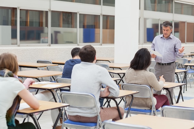 Lecturer talking at top of class