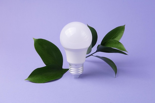 Led bulb with fresh green leafsgreen energy concept