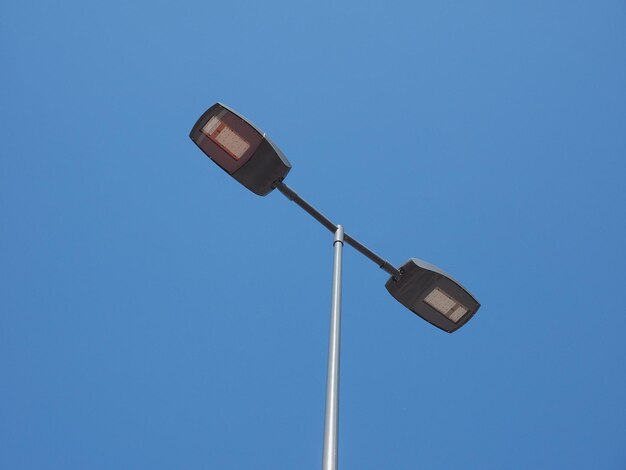 Led street lamp over blue sky