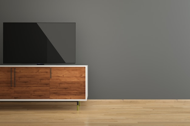 Led TV on TV stand dark Gray wall wood floor interior room