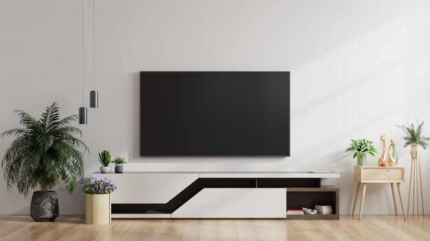 リビングルームの白い壁にLEDテレビ、最小限のデザイン。