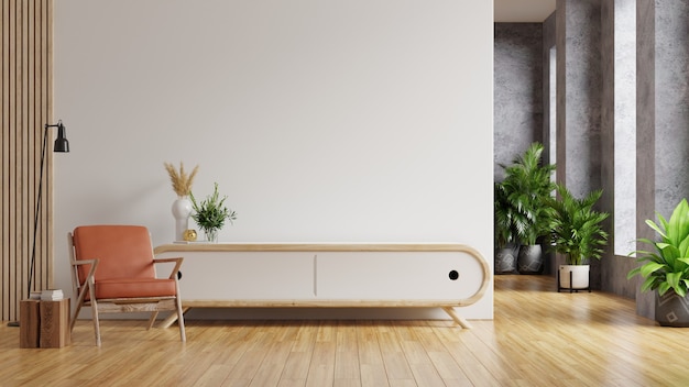 Lederen fauteuil en een houten kast in het interieur van de woonkamer met plant, witte wall.3d rendering