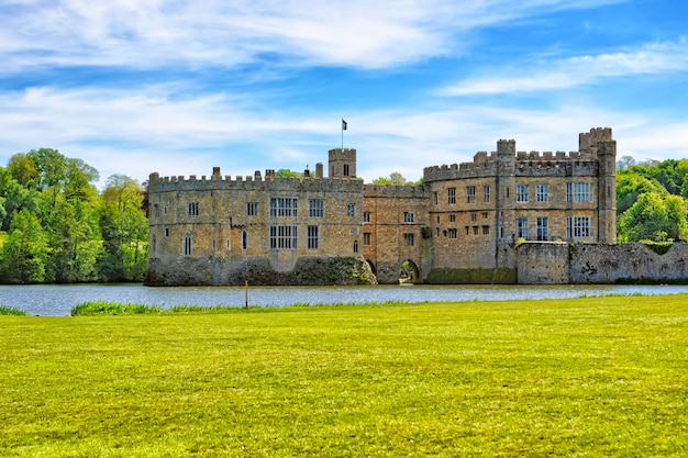 Leeds Castle in an island on the lake in Kent in England. The castle was built in the twelfth century as a king residence. Now it is open to the public.