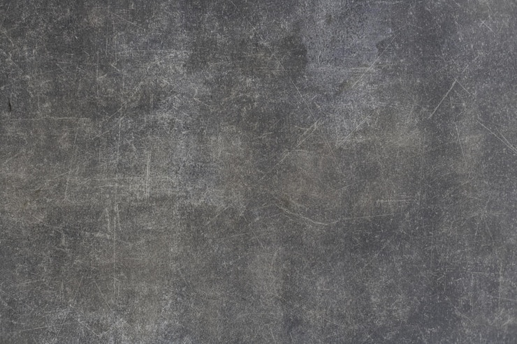 Foto leeg grijs oppervlak met krassen en verouderd effect neutrale achtergrond voor het plaatsen van informatie met een matte textuur