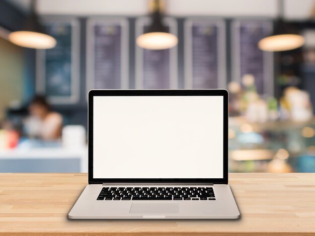 Leeg scherm notebook op houten tafel