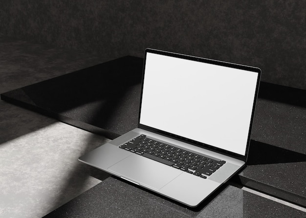 Leeg scherm op laptop op betonnen gipstafel
