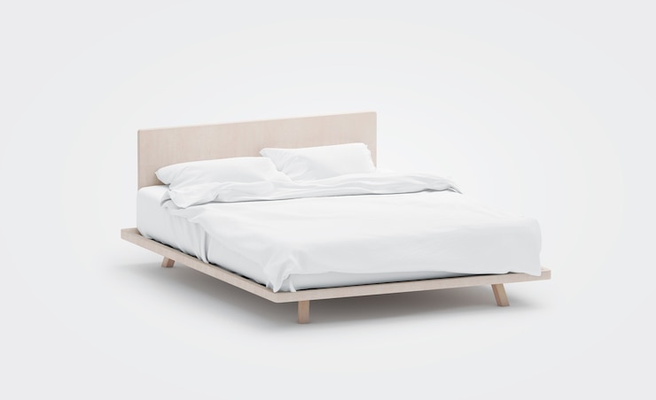 Foto leeg wit bed met kussens mockup 3d-rendering beddengoed mock up duidelijke deken in ledikant