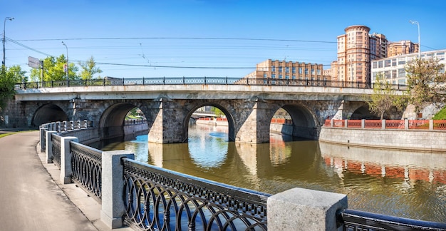 Lefortovsky bridge with arches Yauza river Moscow