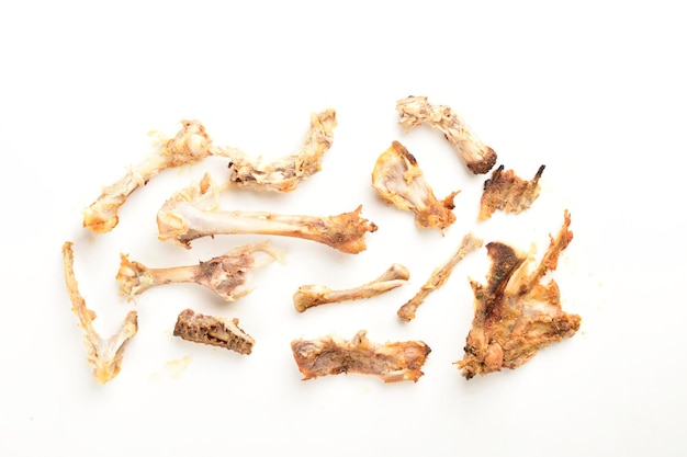 Leftover chicken bones isolate on white background