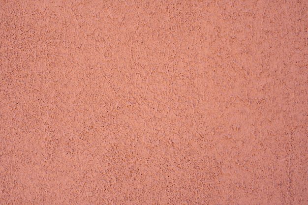 Lege achtergrond Oranje muur poreuze textuur