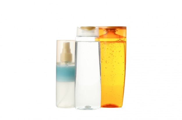 Lege flessen voor cosmetica geïsoleerd op een witte achtergrond