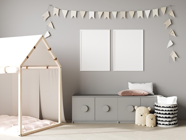 Lege posterframes bespotten op grijze muur in kinderkamer interieur achtergrond met baby beddengoed zacht speelgoed slinger vlaggen 3D-rendering