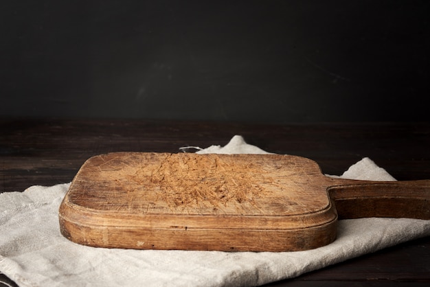 Lege vintage houten snijplank keuken op de tafel