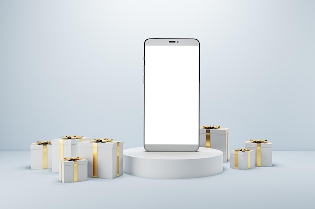 Lege witte mobiele telefoon op creatief voetstuk omringd met witte kerstcadeaudozen