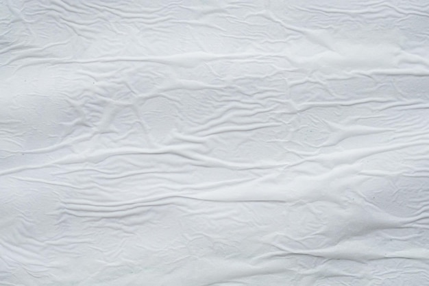 Lege witte verfrommeld gevouwen gescheurd papier poster textuur oppervlakte achtergrond