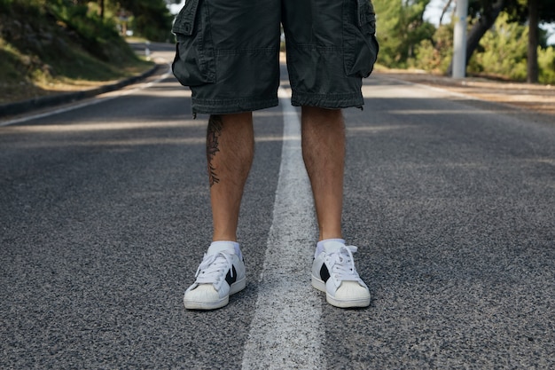 Legs on asphalt