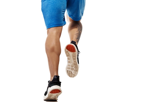 Photo legs of man running on white background. ready to start