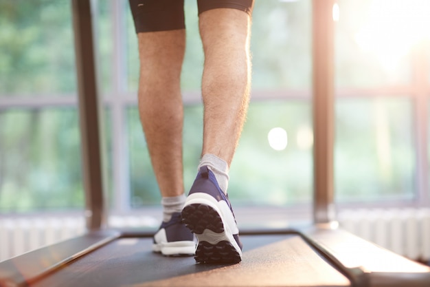 Legs Running on Treadmill