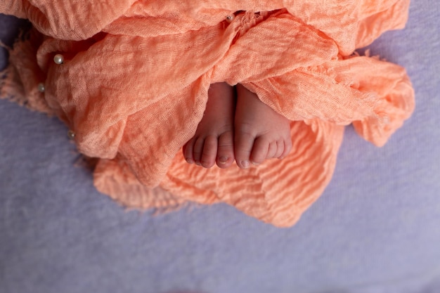 legs of a small child close-up. a little happiness.