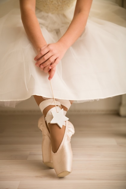 Photo legs of young ballerina, ballet dancing