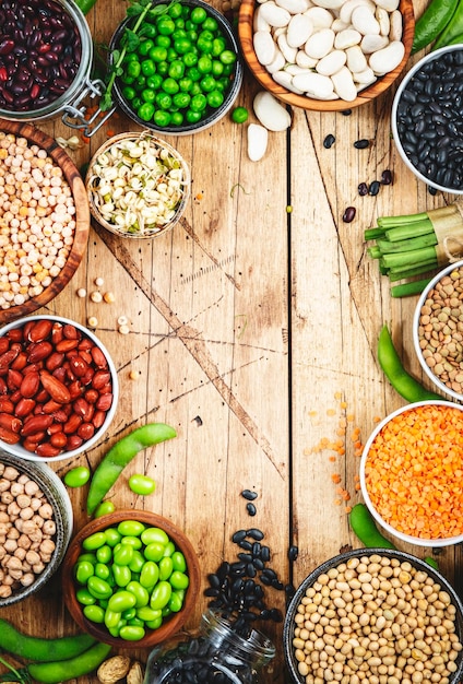 Legumes beans and sprouts dried raw and fresh top view lentils\
mung beans chickpeas soybeans edamame peas healthy diet food vegan\
proetin micronutrients and fiber sources