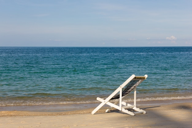 Leisure time on beach hammock, white chair. Summer vacation, paradise travel destination, relax chill out mood concept