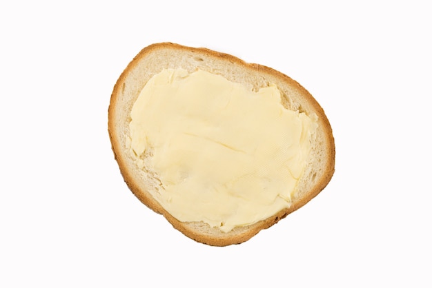 Lekker brood en boter geïsoleerd op een witte achtergrond.